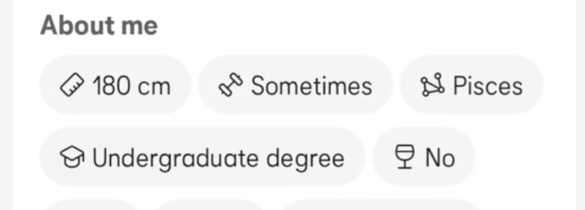A screenshot of icon usage in the "About me" section of a Bumble profile. In the screenshot, a ruler indicates height, weights indicate how active a person is, graduation cap indicates a person's education level, and a wine cup indicates how often does a person drinks. 